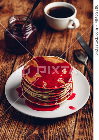 Stack of pancakes with berry fruit marmalade 49455886