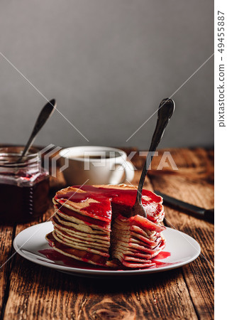 Stack of pancakes with berry fruit marmalade 49455887