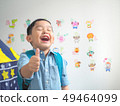 Happy smiling boy with showing thumbs up 49464099
