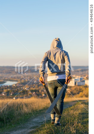 A people with a machete 49464616