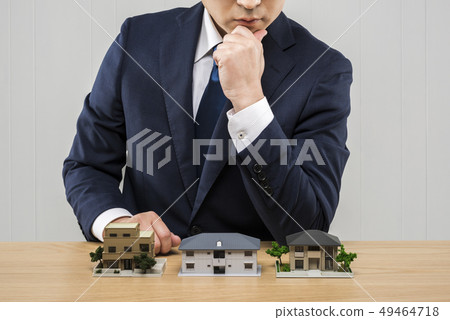 Architectural model and businessman Architectural model and businessman 49464718