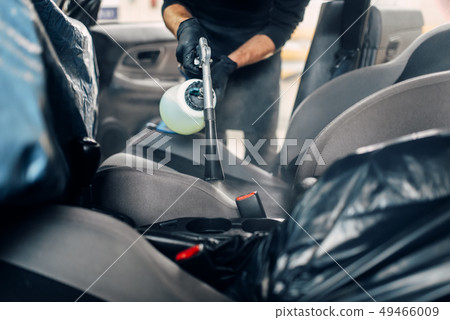 Professional dry cleaning of car seats 49466009