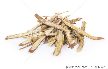 Sliced liquorice root on white. Sliced liquorice root on white. 49466324