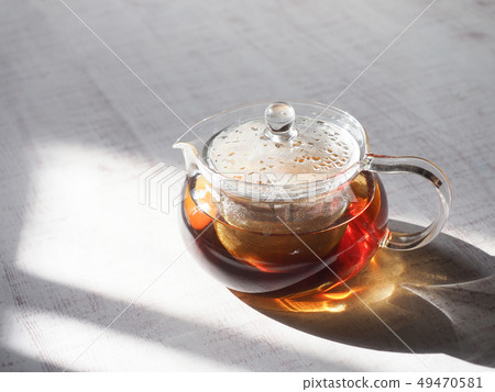 Glass teapot and tea Glass teapot and tea 49470581