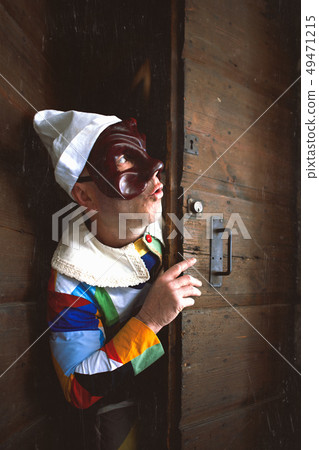 The mask of Arlecchino. Look out the door 49471215