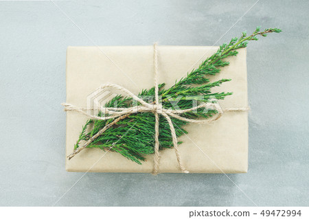 isolated present or gift box in craft paper isolated present or gift box in craft paper 49472994
