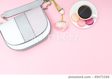 ladies handbag on pink 49473389