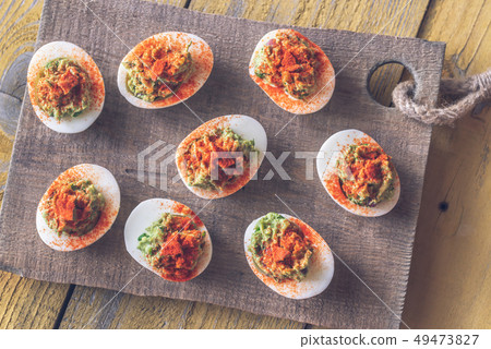 Guacamole and bacon deviled eggs 49473827