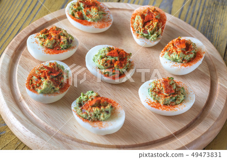 Guacamole and bacon deviled eggs 49473831