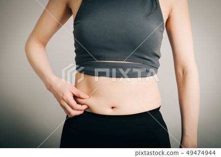 Young Japanese woman who eats stomach belly Diet image Young Japanese woman who eats stomach belly Diet image 49474944