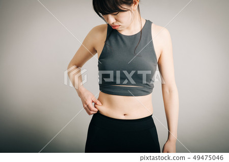 Young Japanese woman who eats stomach belly Diet image 49475046