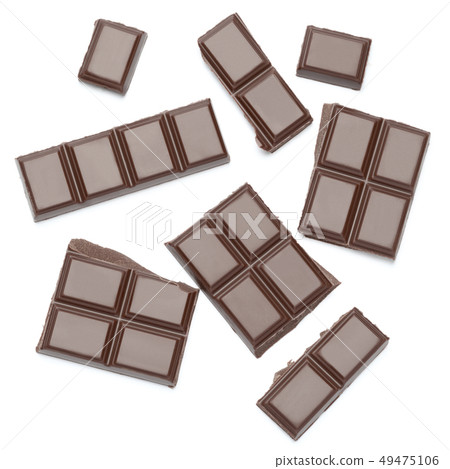 Dark organic chocolate pieces isolated on white background 49475106