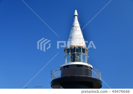 Photographed with a clear sky the Motatada lighthouse, Hokkaido's secluded town, at the height of Japan's highest sea level 49476686