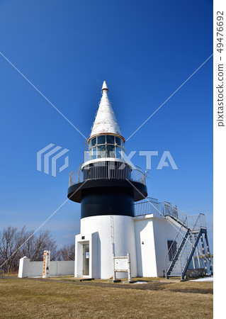 Photographed with a clear sky the Motatada lighthouse, Hokkaido's secluded town, at the height of Japan's highest sea level Photographed with a clear sky the Motatada lighthouse, Hokkaido's secluded town, at the height of Japan's highest sea level 49476692