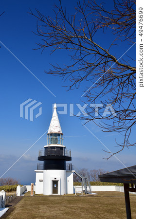 Photographed with a clear sky the Motatada lighthouse, Hokkaido's secluded town, at the height of Japan's highest sea level Photographed with a clear sky the Motatada lighthouse, Hokkaido's secluded town, at the height of Japan's highest sea level 49476699
