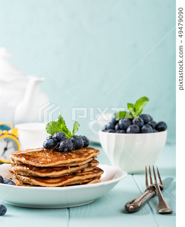 Delicious pancakes with chocolate drops Delicious pancakes with chocolate drops 49479090