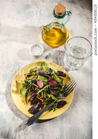 Fresh salad mix of baby spinach, arugula leaves Fresh salad mix of baby spinach, arugula leaves 49480619