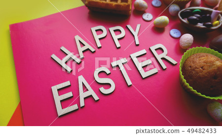 Decor Easter eggs on pink background. Flat lay, top view. Easter concept. Decor Easter eggs on pink background. Flat lay, top view. Easter concept. 49482433