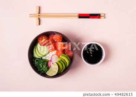 Hawaiian salmon poke with avocado, chopsticks and 49482615