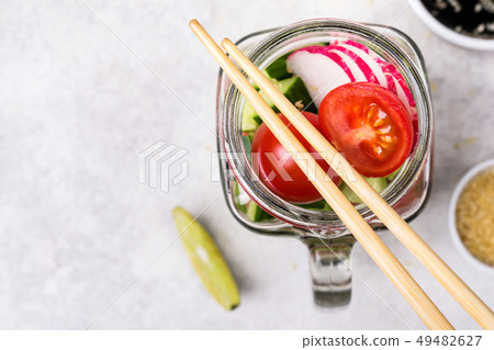 Hawaiian salmon poke salad with vegetables in Hawaiian salmon poke salad with vegetables in 49482627