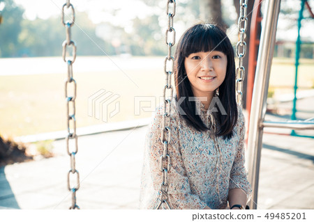 One by one in a park. One by one in a park. 49485201