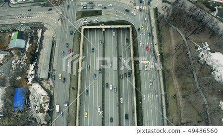 Aerial down view of a busy wide city road 49486560