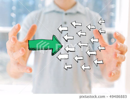 Arrow facing in a opposite direction with young man Arrow facing in a opposite direction with young man 49486883