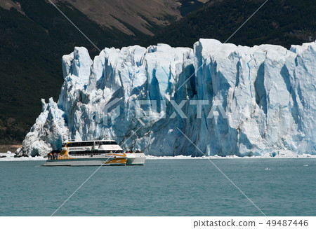 Boat at glacier Perito Moreno in El Calafate, Patagonia, Argentina Boat at glacier Perito Moreno in El Calafate, Patagonia, Argentina 49487446