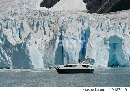 Boat at glacier Perito Moreno in El Calafate, Patagonia, Argentina 49487449