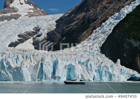 Boat at glacier Perito Moreno in El Calafate, Patagonia, Argentina 49487450