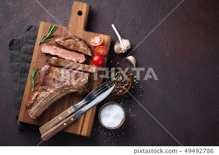 Grilled cowboy beef steak. Grilled cowboy beef steak. 49492786