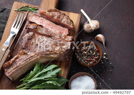 Grilled cowboy beef steak. Grilled cowboy beef steak. 49492797