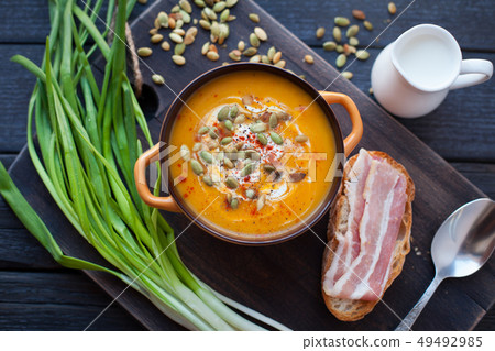 Homemade pumpkin soup with cream. Homemade pumpkin soup with cream. 49492985