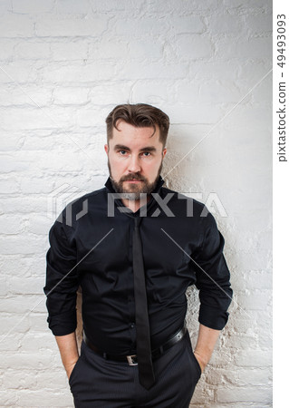 Portrait of a bearded serious man in sunglasses. 49493093