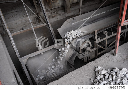 Industrial belt conveyor moving raw materials from mine Industrial belt conveyor moving raw materials from mine 49493795