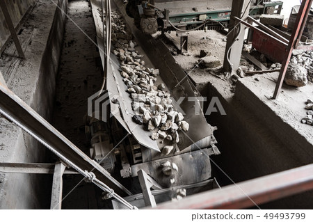 Industrial belt conveyor moving raw materials from mine Industrial belt conveyor moving raw materials from mine 49493799