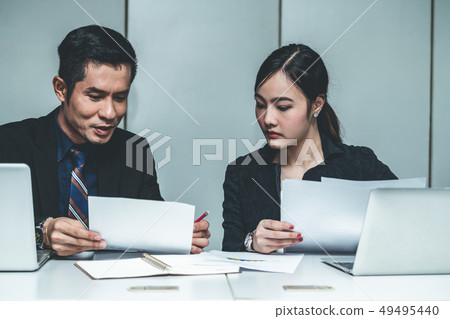 Business people in group meeting work in office. Business people in group meeting work in office. 49495440