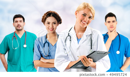Doctor working in hospital with other doctors. 49495724