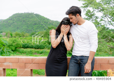The unhappy couple of man and woman. 49495904