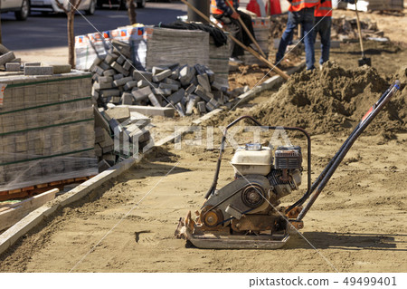 An old gasoline compactor for compacting sandy 49499401