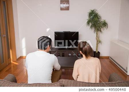 Married couple in the living room Married couple in the living room 49500448