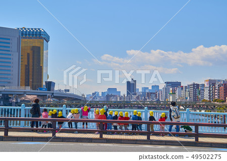 Children looking southwest from Asakusa Bridge (Mito Kaido) in Asakusa, Tokyo 49502275