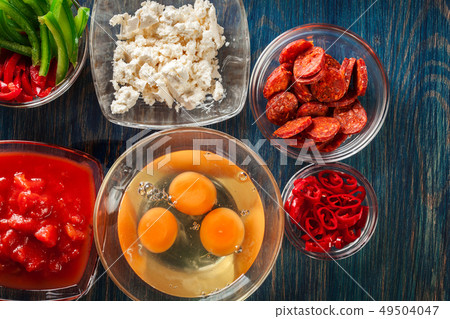 Ingredients for preparing frittata - eggs, sausage Ingredients for preparing frittata - eggs, sausage 49504047
