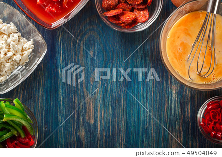 Ingredients for preparing frittata - eggs, sausage 49504049