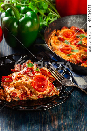 Portion of frittata with eggs, sausage chorizo, 49504051