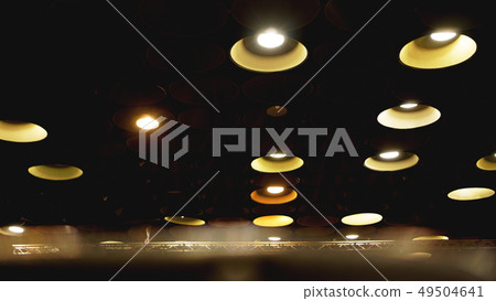 Spot lights in cinema hall on ceiling Spot lights in cinema hall on ceiling 49504641