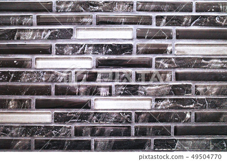 Abstract background black and white tiles wall Abstract background black and white tiles wall 49504770