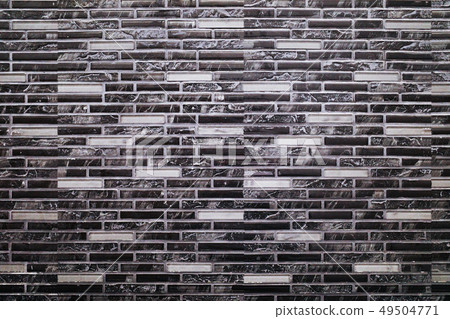 Abstract background black and white tiles wall Abstract background black and white tiles wall 49504771