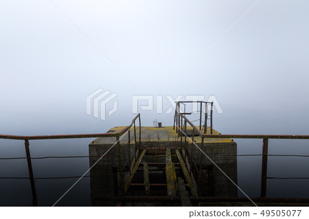 Damaged pier in the mist at morning Damaged pier in the mist at morning 49505077