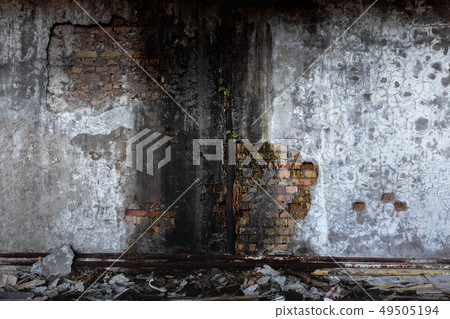 Abandoned damaged building wall 49505194